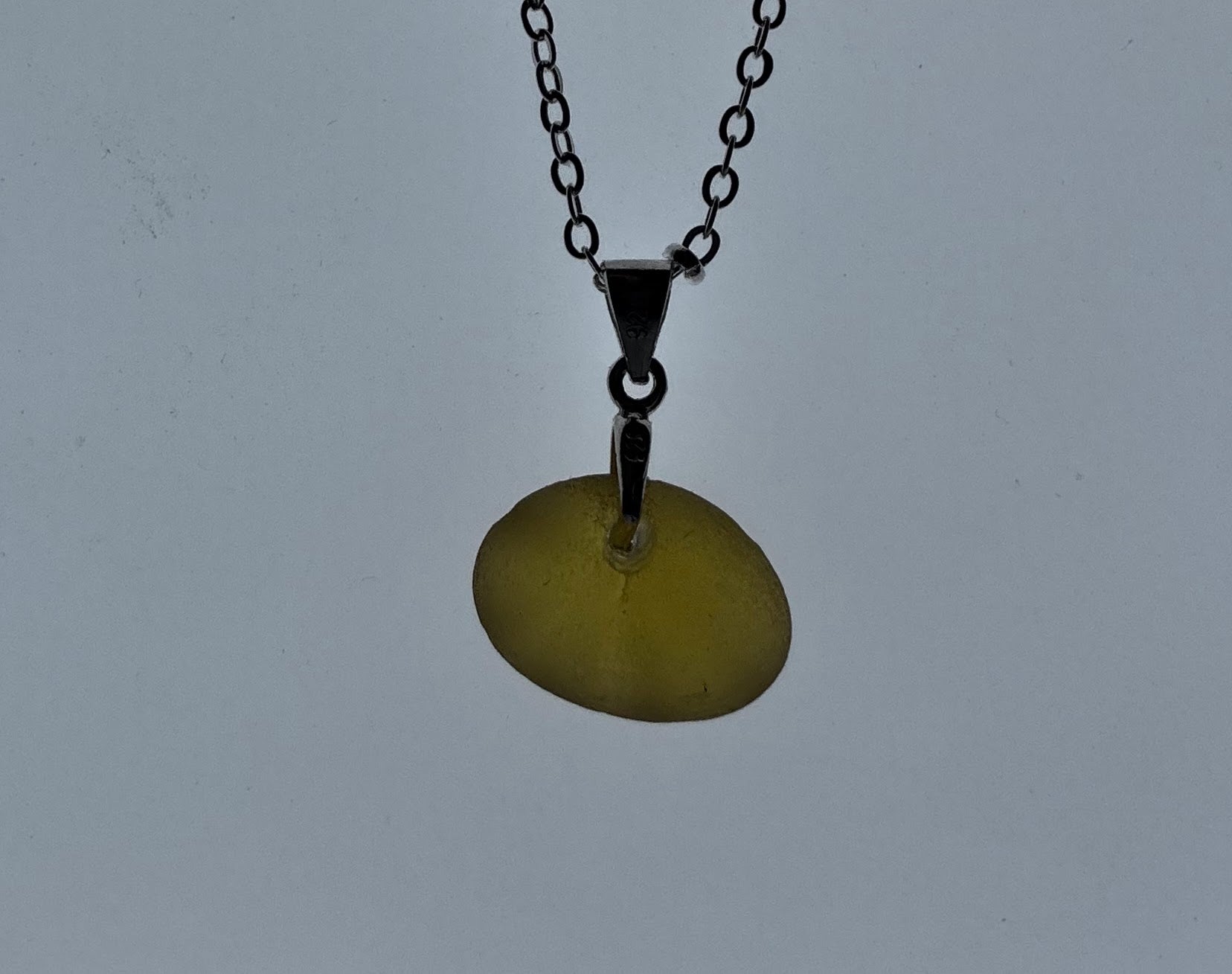 Pale orange oval seaham seaglass pendant on silver chain