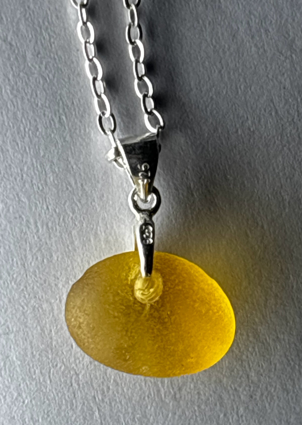 Pale orange oval seaham seaglass pendant on silver chain